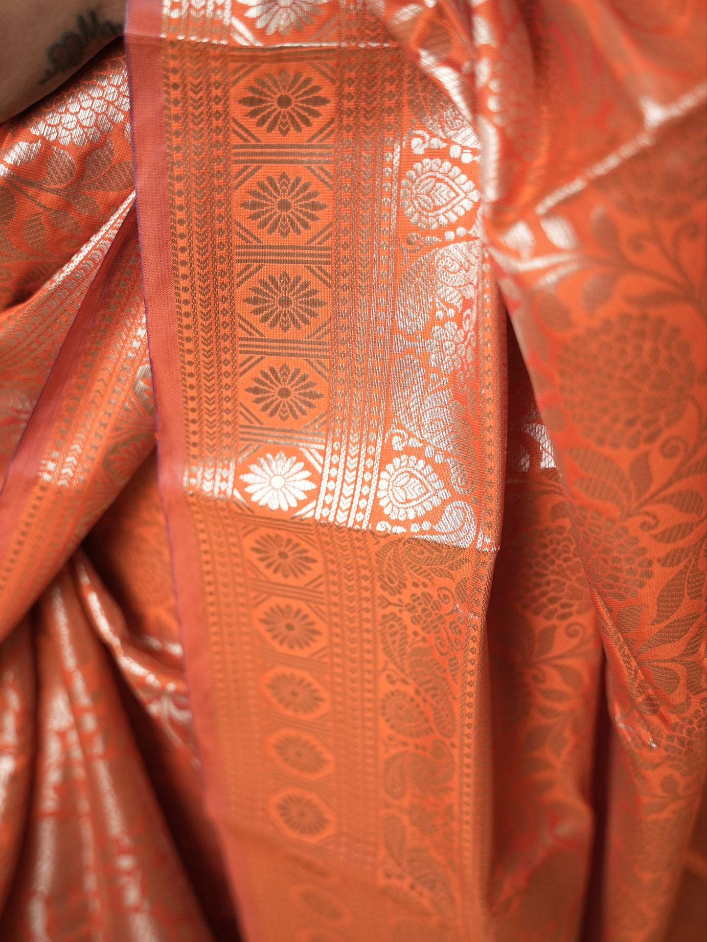Radiant bright orange chinia silk saree