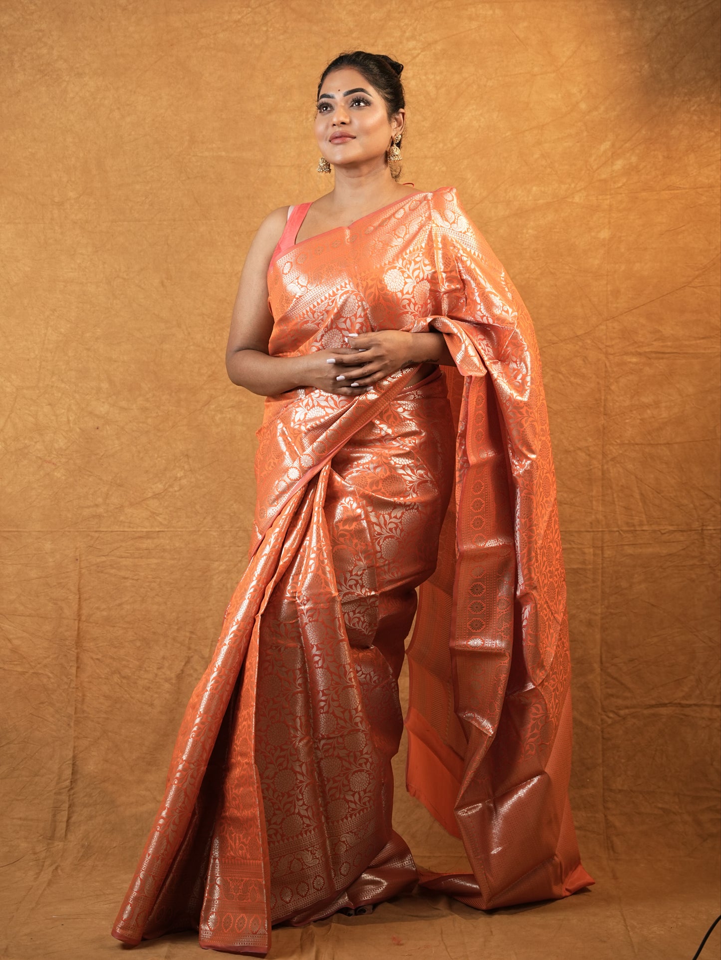 Radiant bright orange chinia silk saree