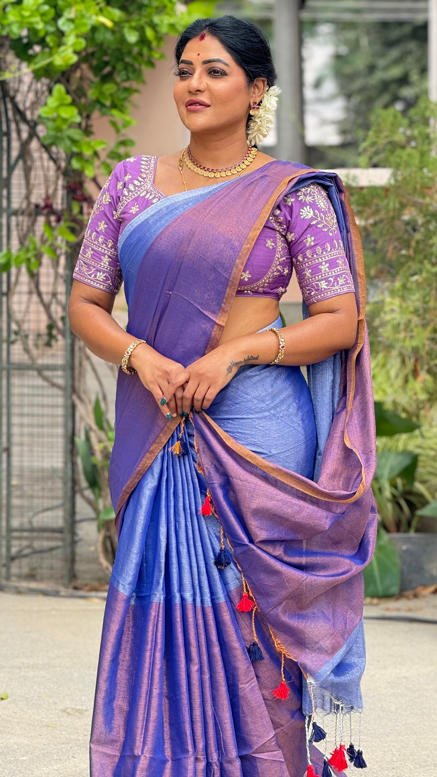 Swarna tissue saree with tassels