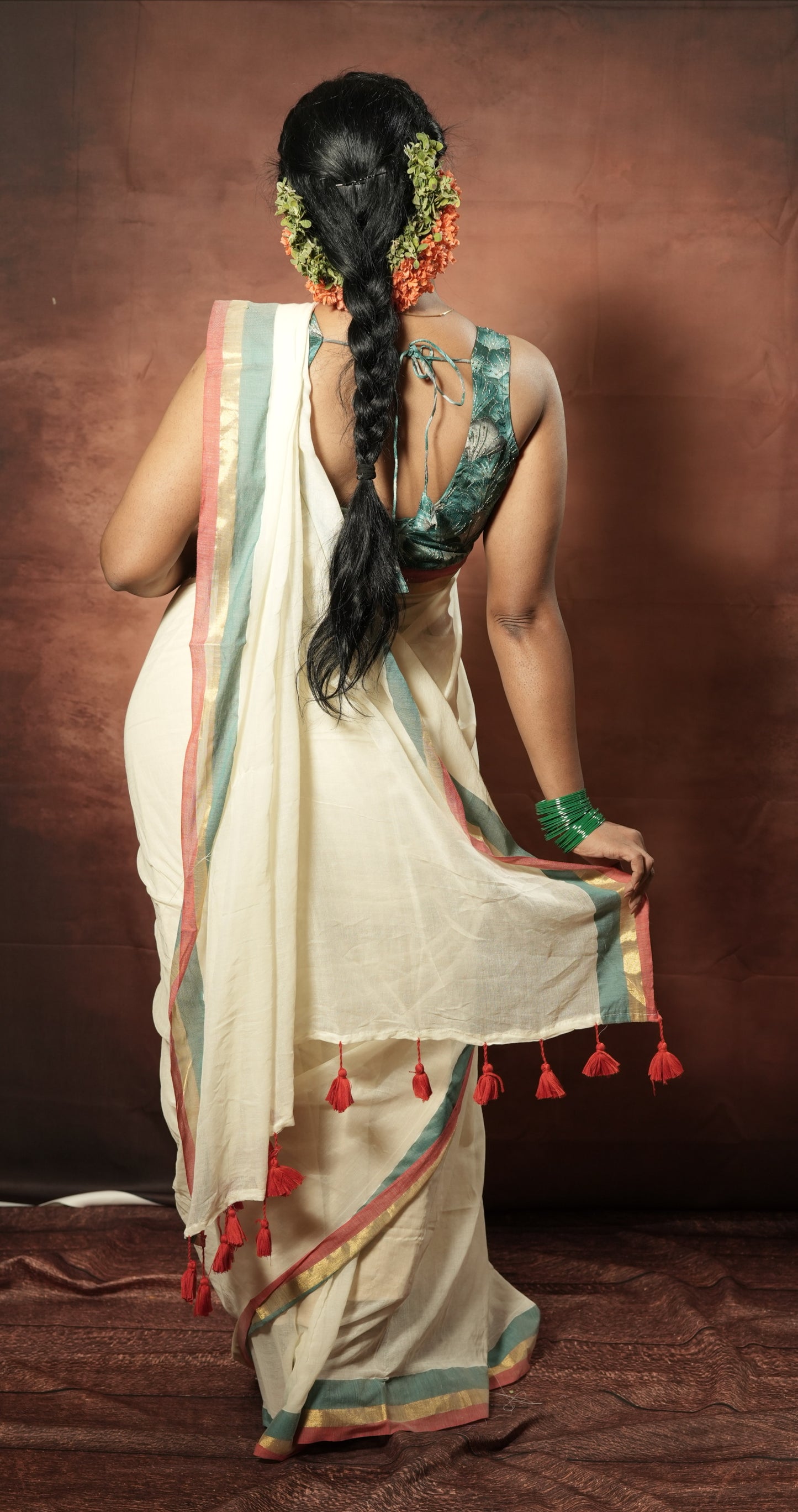 Onam special Mul cotton with red & green Zari