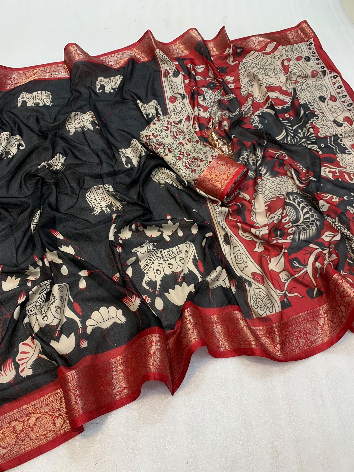 soft mul mul cotton saree with Kalamkari & pichwai work all over the saree with contrast zari border blouse