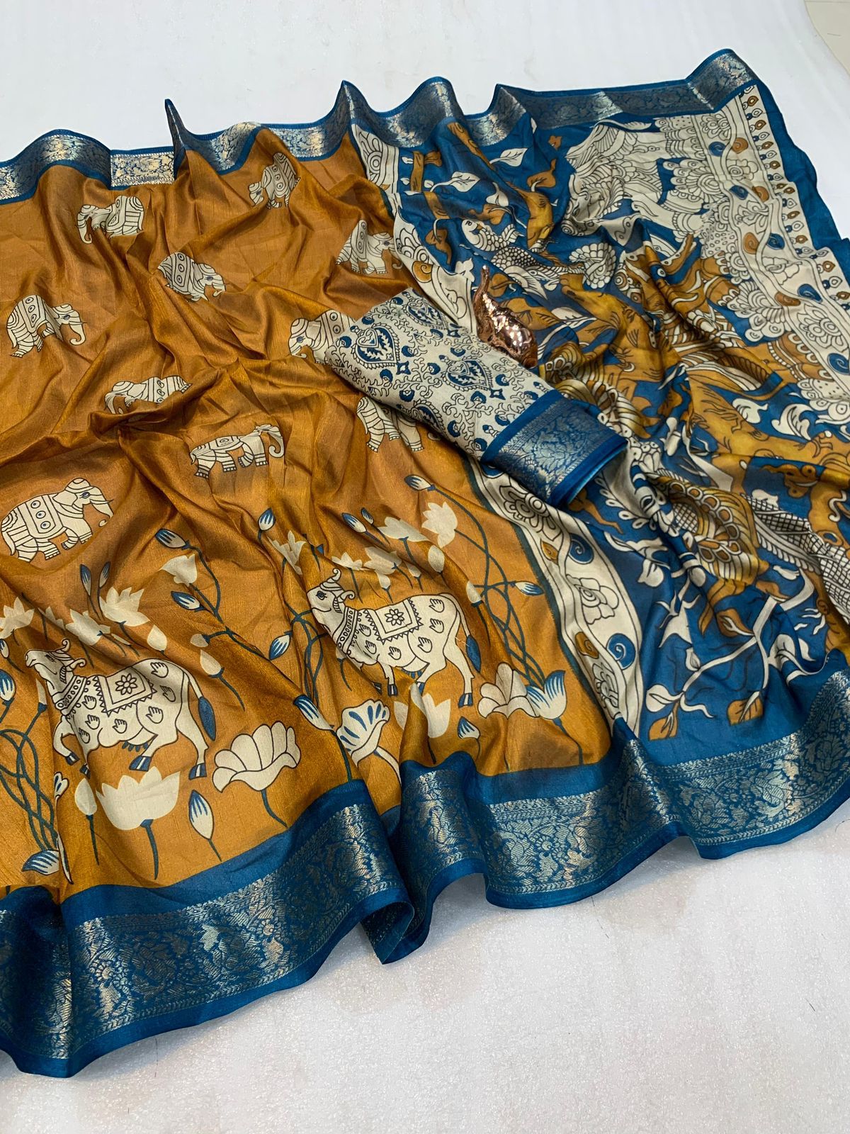 soft mul mul cotton saree with Kalamkari & pichwai work all over the saree with contrast zari border blouse