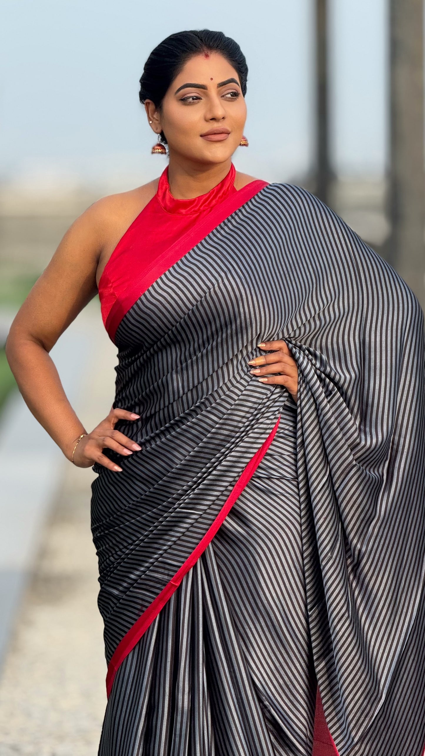 Ajrakh modal stripped pattern saree with running contrast blouse