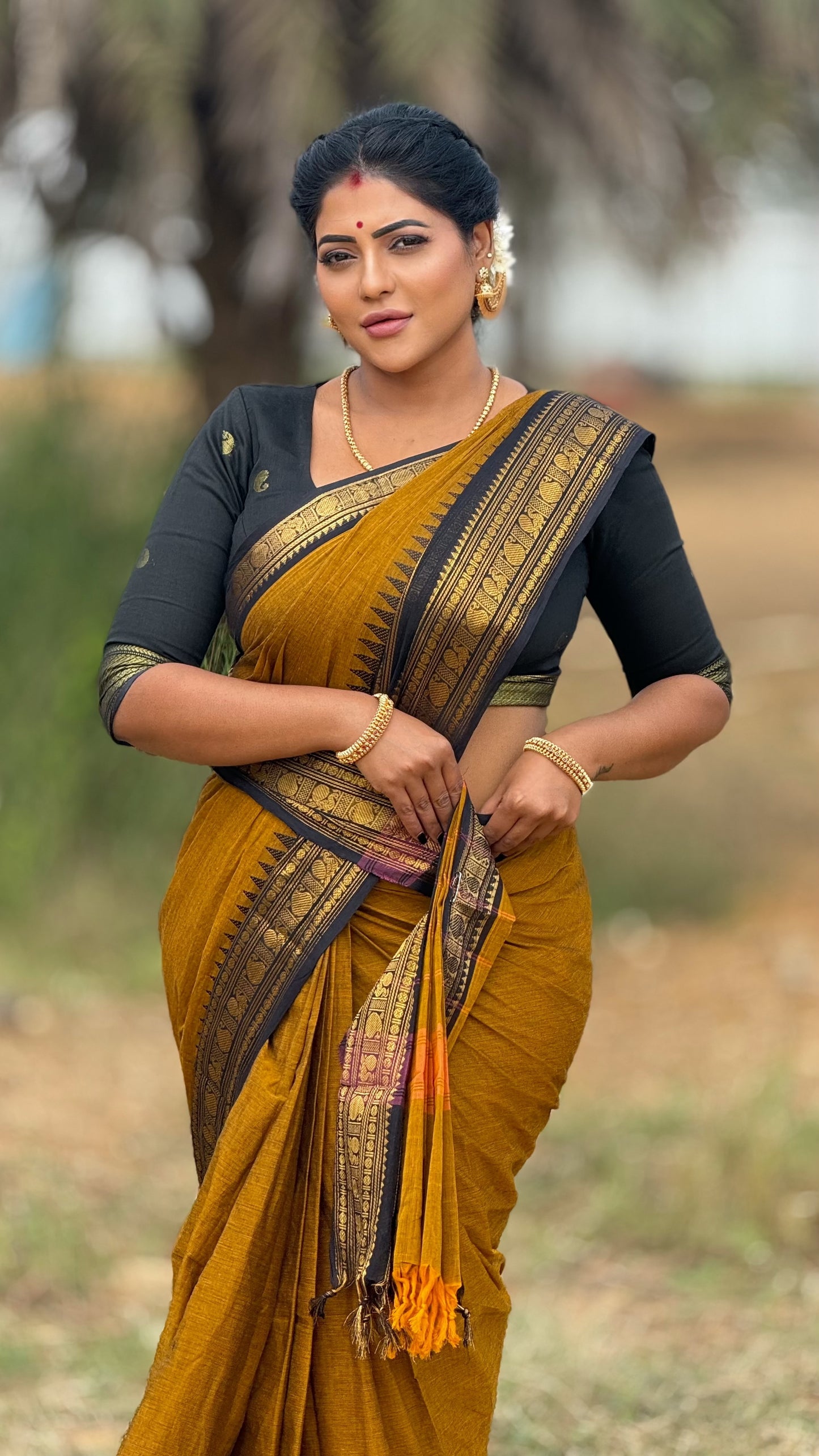 Kanchi cotton saree with zari border and running blouse